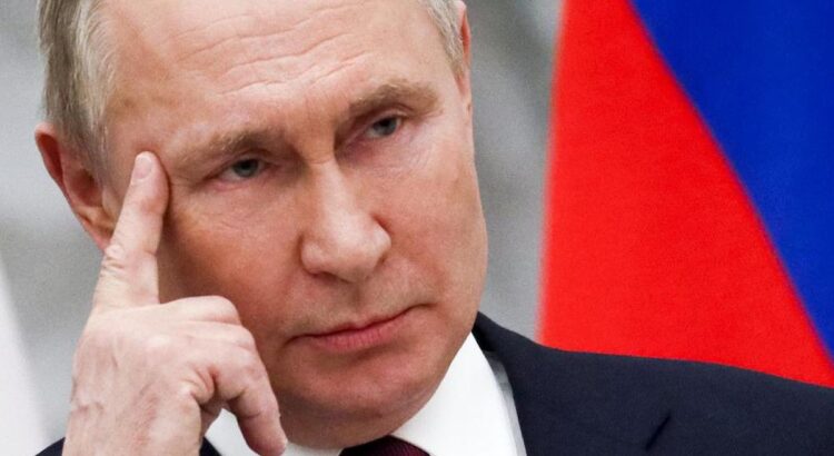 a man in a suitKekuatan Militer Rusia di Era Vladimir Putin: Selama 25 Tahun Kepempinan Vladimir Putin